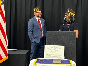 Army Veteran John Gist. Member of Board of Directors accepted donations on behalf of Foxhole from Michigan VFW and Michigan VFW Auxiliary.