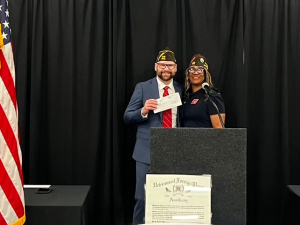 Army Veteran John Gist. Member of Board of Directors accepted donations on behalf of Foxhole from Michigan VFW and Michigan VFW Auxiliary.