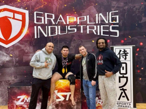 Foxhole Vet, Marine Mac (seated below) won double gold in his 1st tournament!